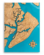 Wooden map of Hilton Head Island with a compass rose on a blue background