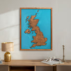 Large wooden UK map with resin hanging on living room wall

