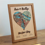 Three-location wooden heart map in an Early American oak frame with raised names and Our Love Story lettering.