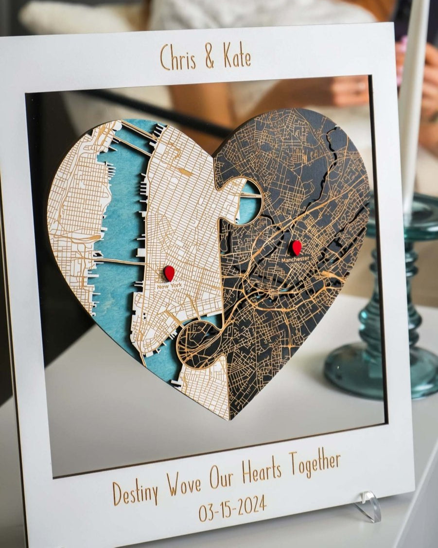 Heart-shaped map artwork with personalized text on a stand