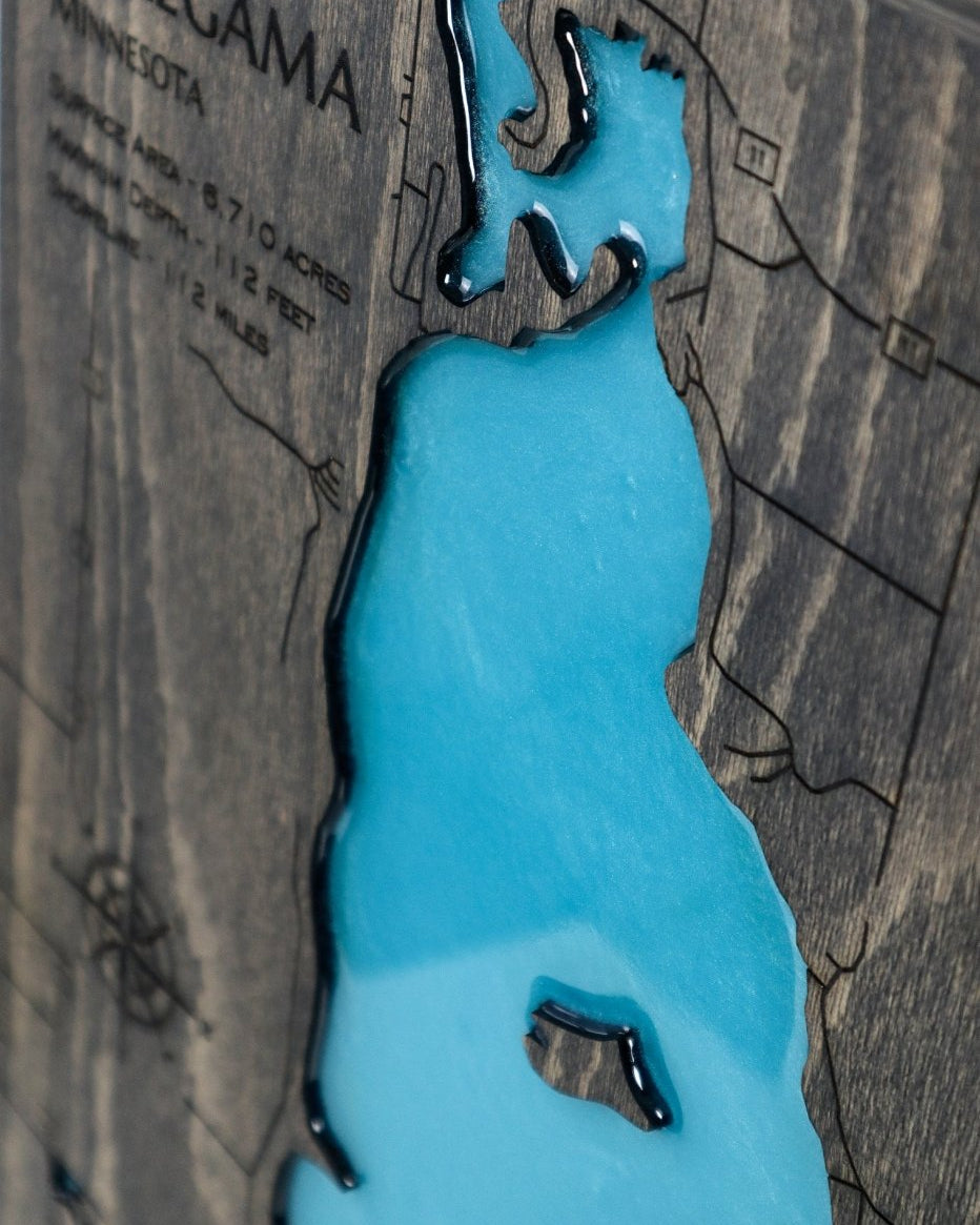 Map of Lake POKEGAMA with a blue fill on a wooden surface