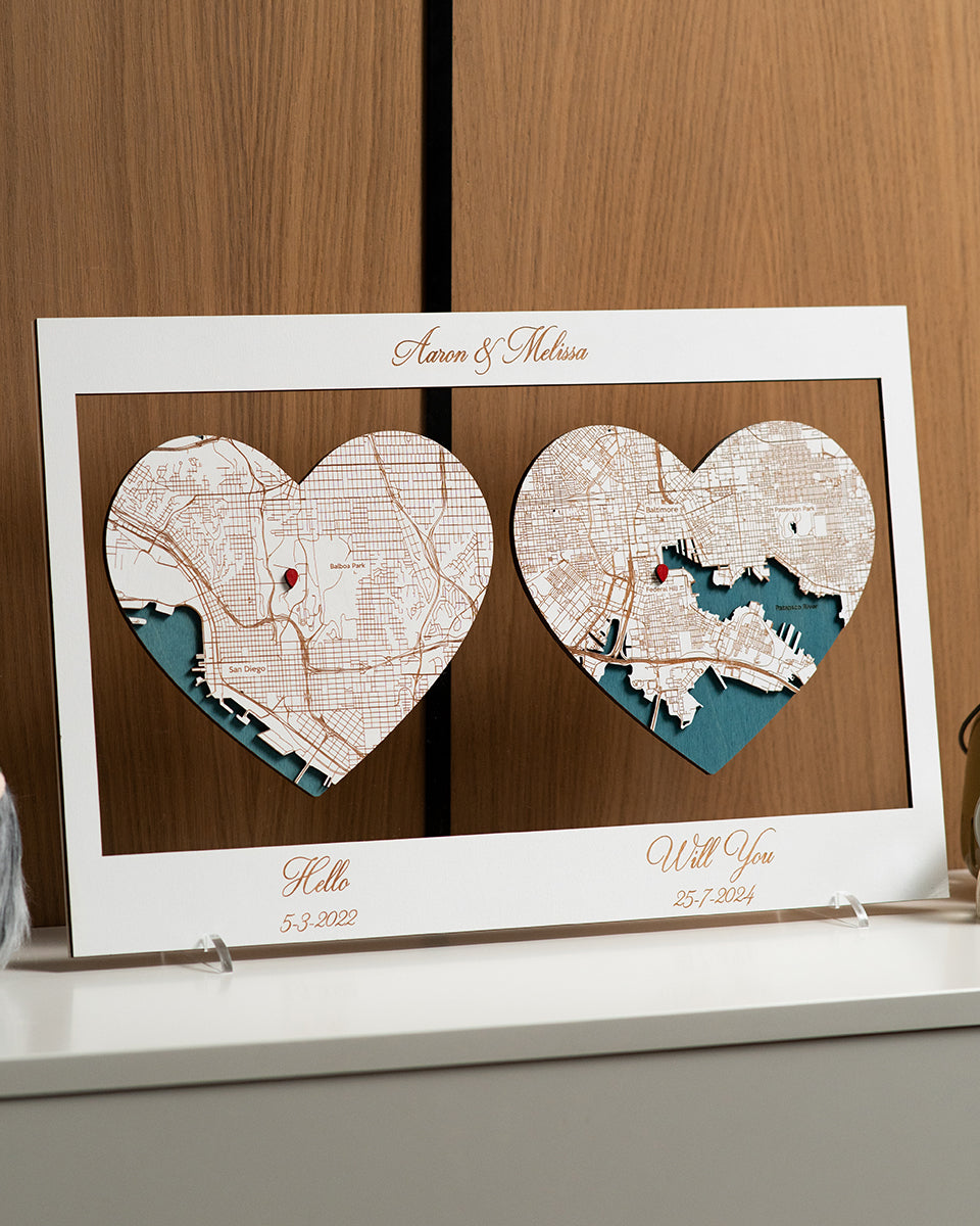 Heart-shaped map design with personalized text on a wooden surface
