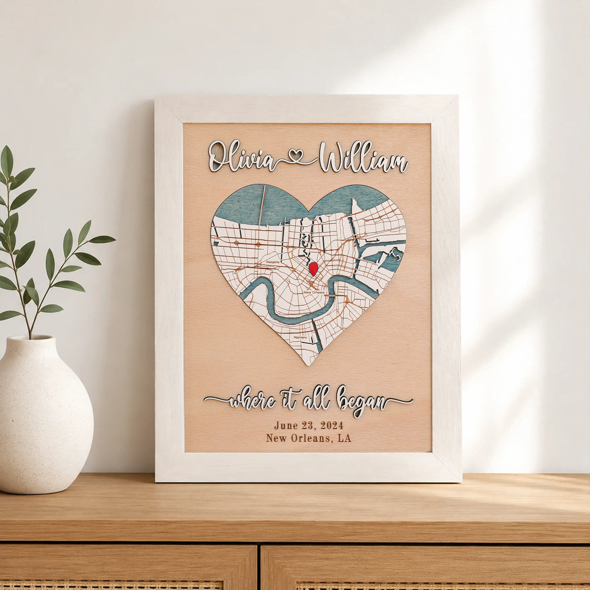 3D wooden Where It All Began map in a white frame, personalized anniversary keepsake with heart-shaped New Orleans location map and couple names