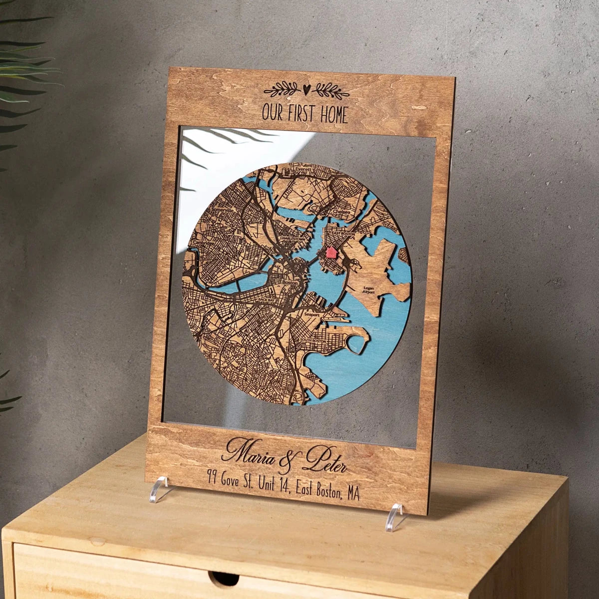Personalized First Home map displayed on stand with custom wooden city map and engraved names
