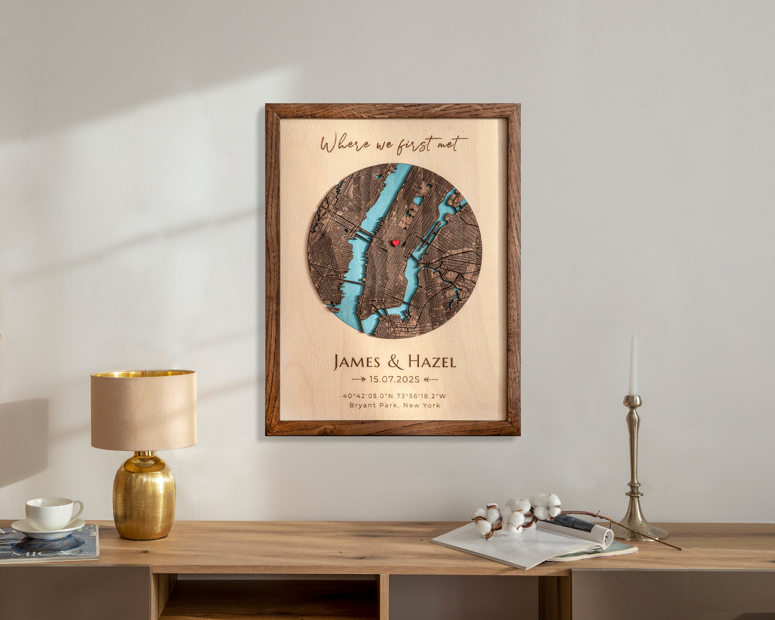 Framed map print on a wall above a wooden desk with decorative items.