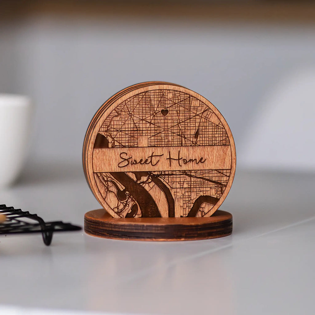 Custom engraved wooden coasters gift set with holder displayed on table for a personalized home gift