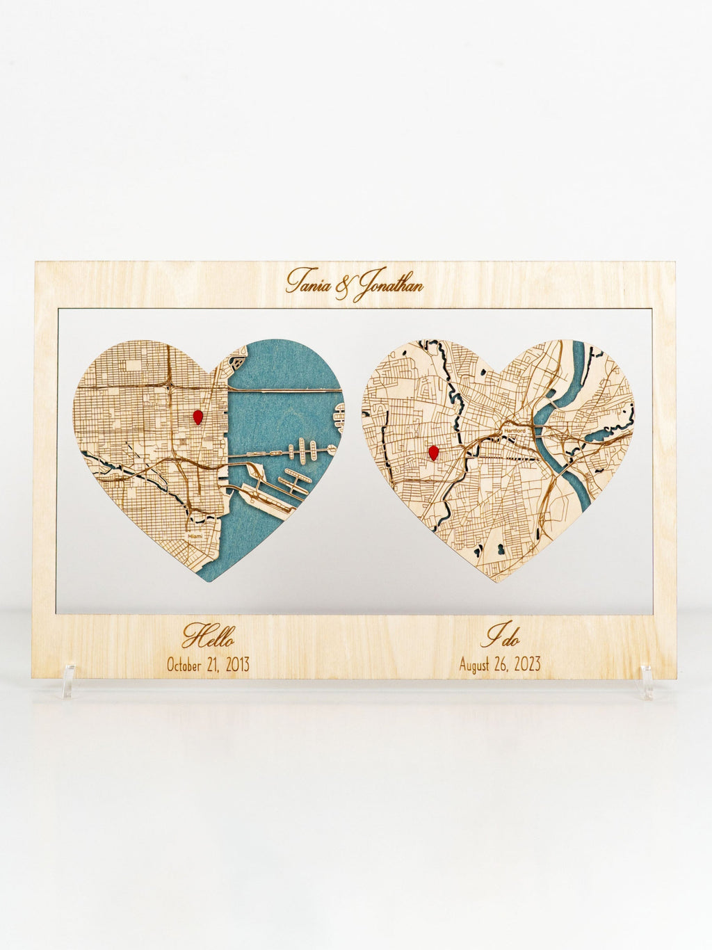 Personalized wooden frame with map engraving text, hearts, and inscriptions "Hello" and "I Do"