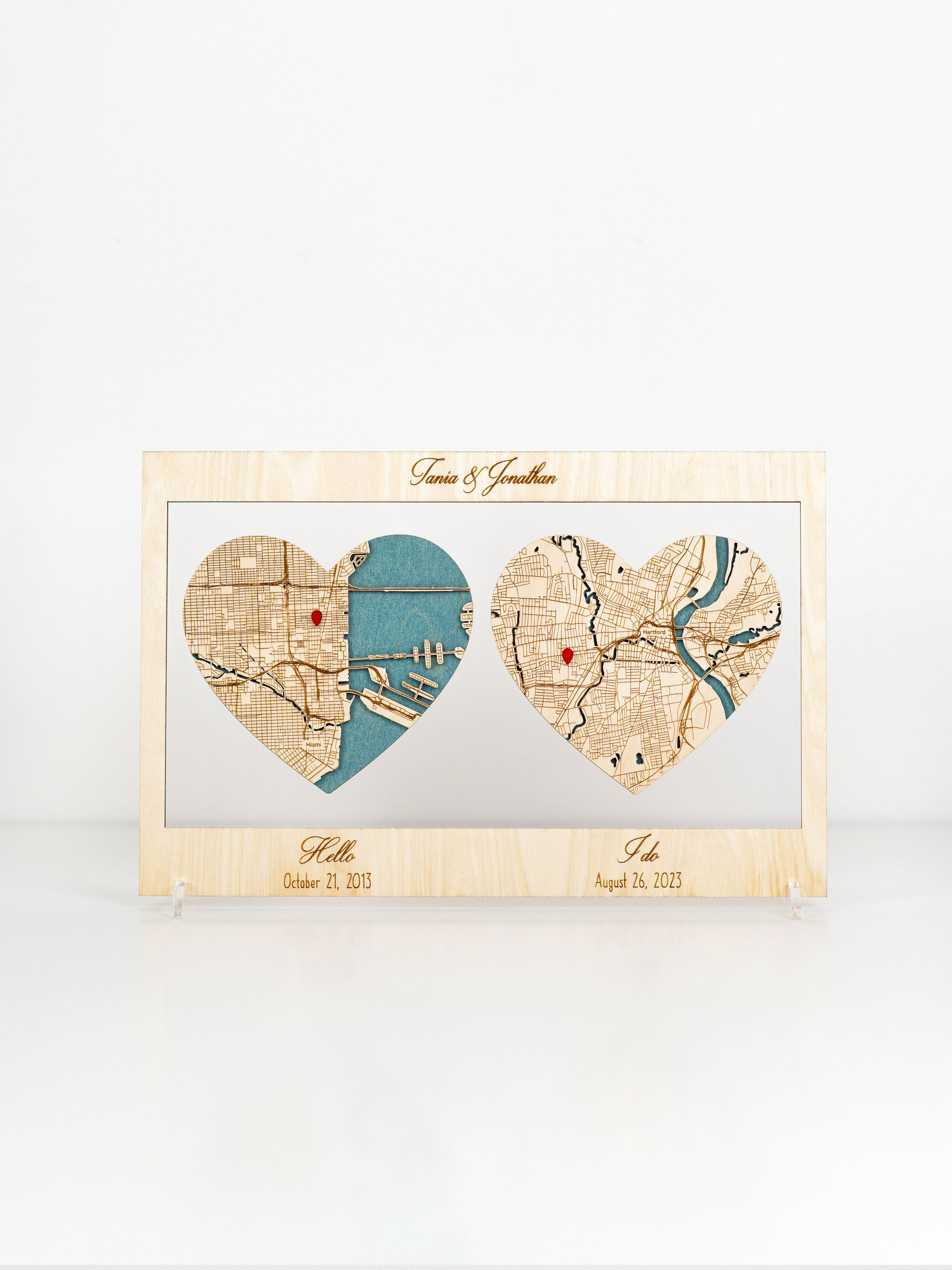 Personalized wooden frame with map engraving text, hearts, and inscriptions "Hello" and "I Do"