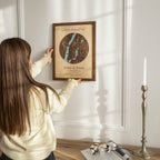 Framed personalized wooden map wall art displayed in modern living room