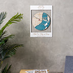 Personalized white framed first home wooden map hanging on a gray wall, custom housewarming gift with 3D Miami location art and family names.