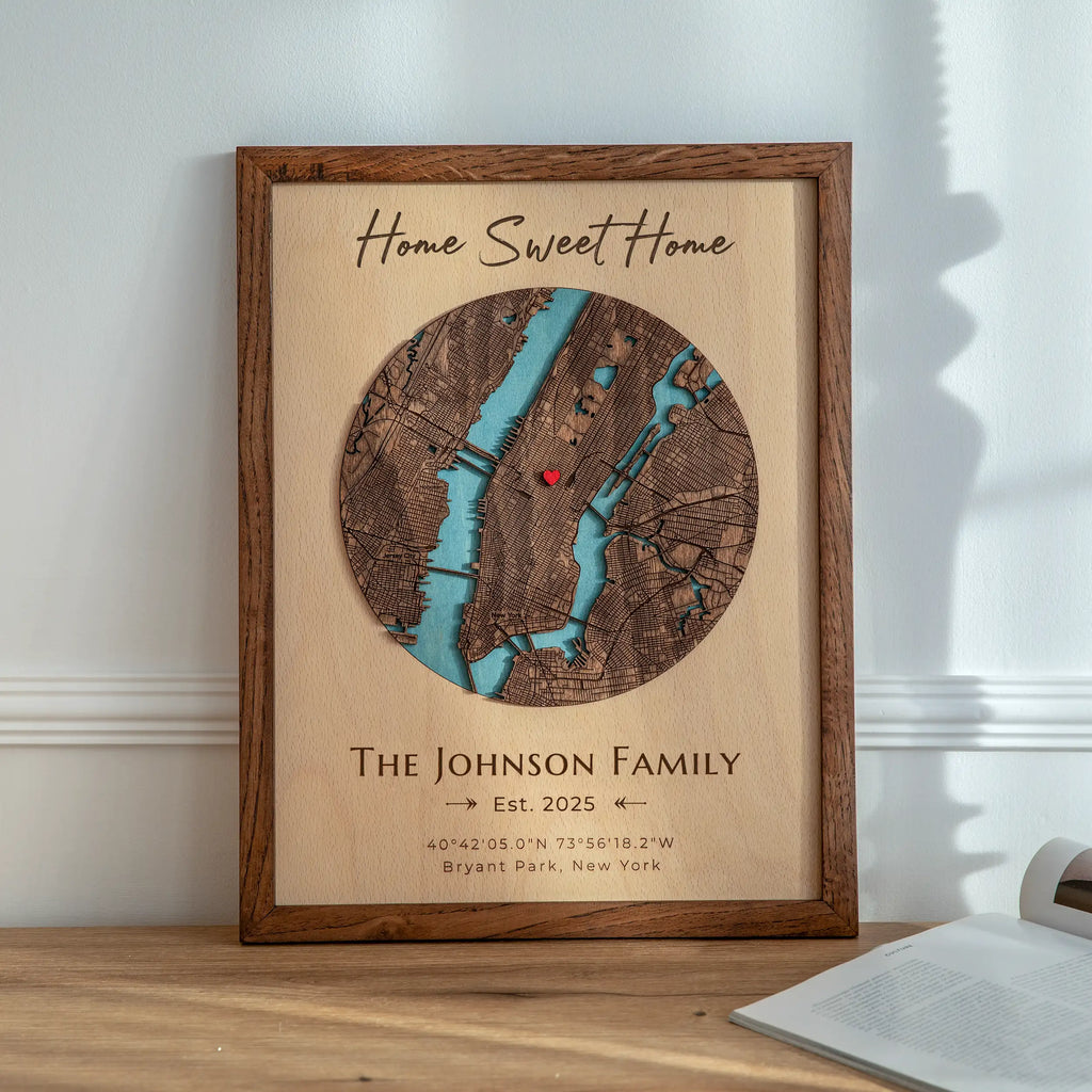 Framed personalized new home gift with custom address map, solid oak frame, Home Sweet Home text, circular New York map design, heart location pin, and family name.
