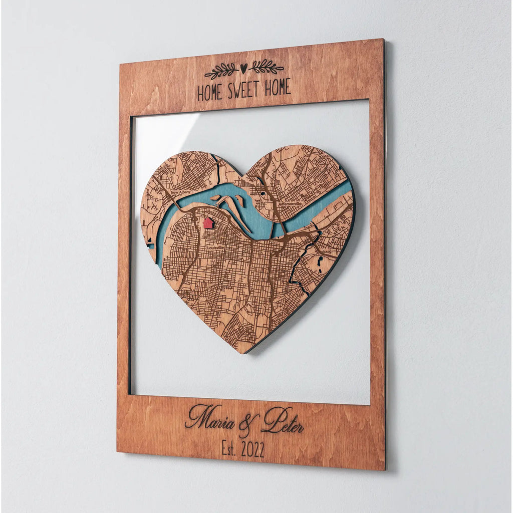 Angled view of Personalized New Home Map wooden keepsake with heart city map and custom Home Sweet Home frame