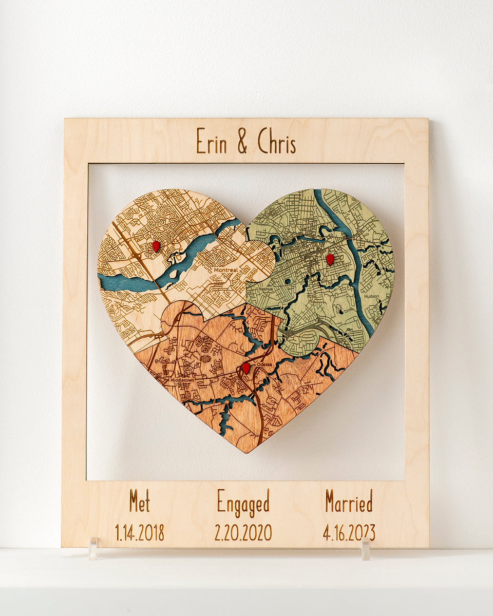 Heart-shaped map collage with personalized dates on a light background