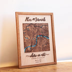 Personalized wooden Where We Met map in a natural oak frame with raised 3D names, custom London location, coordinates, and date.