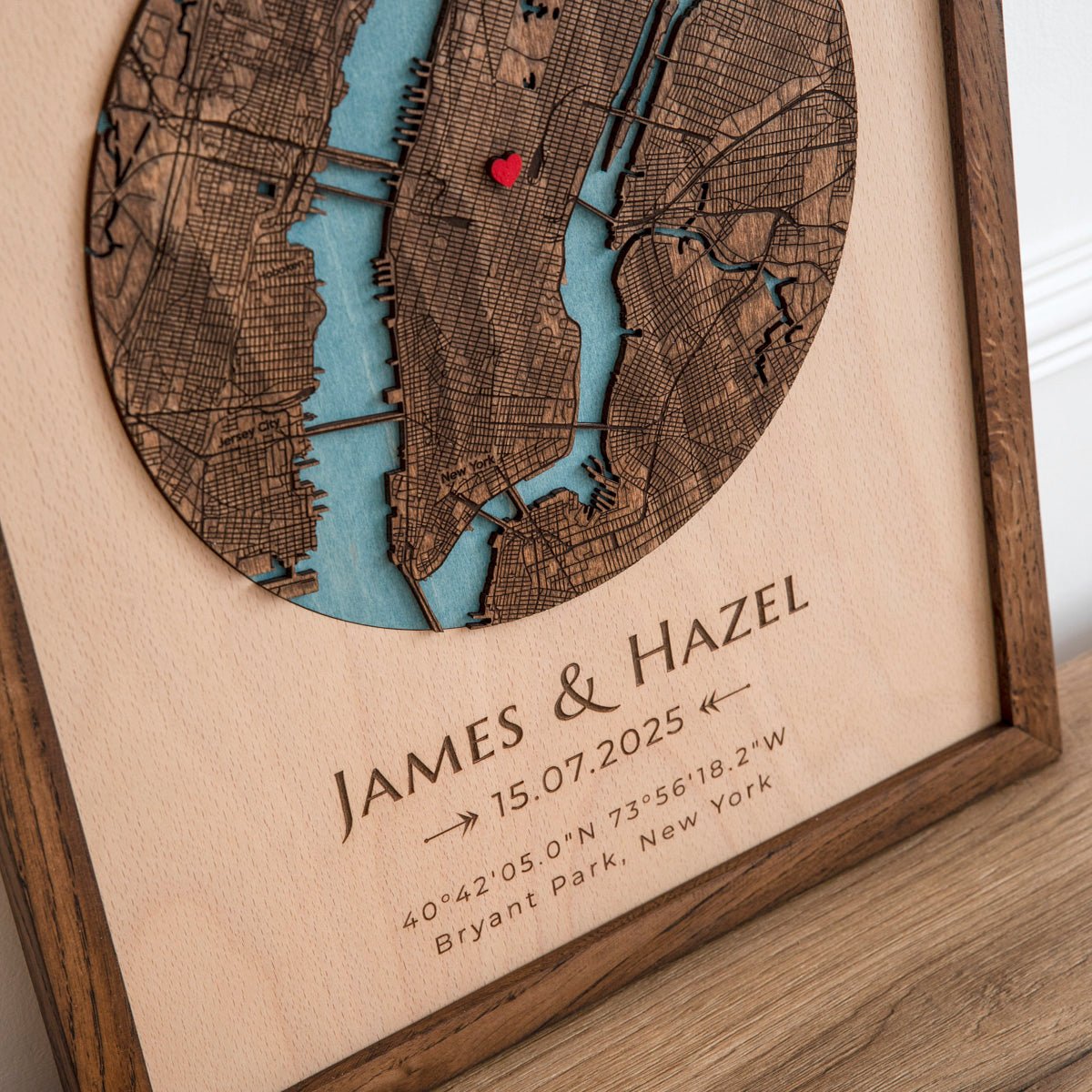 Close up of layered 3D wooden map showing detailed city streets and custom location pin