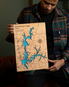 Person holding a wooden map of Smithville Lake with blue accents