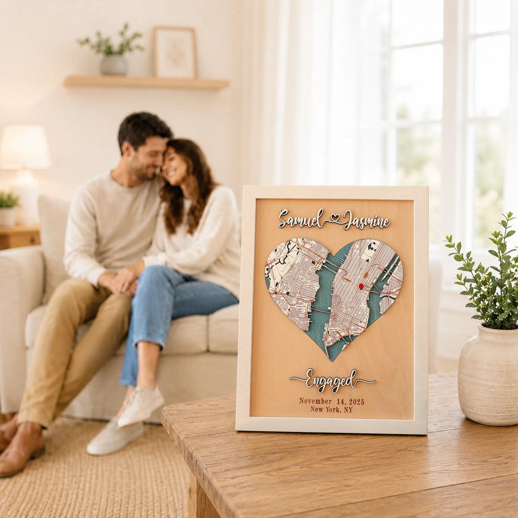 Personalized wedding anniversary gift for couples displayed in a bright living room, featuring a 3D wooden heart map, custom New York location, raised names, and white frame.