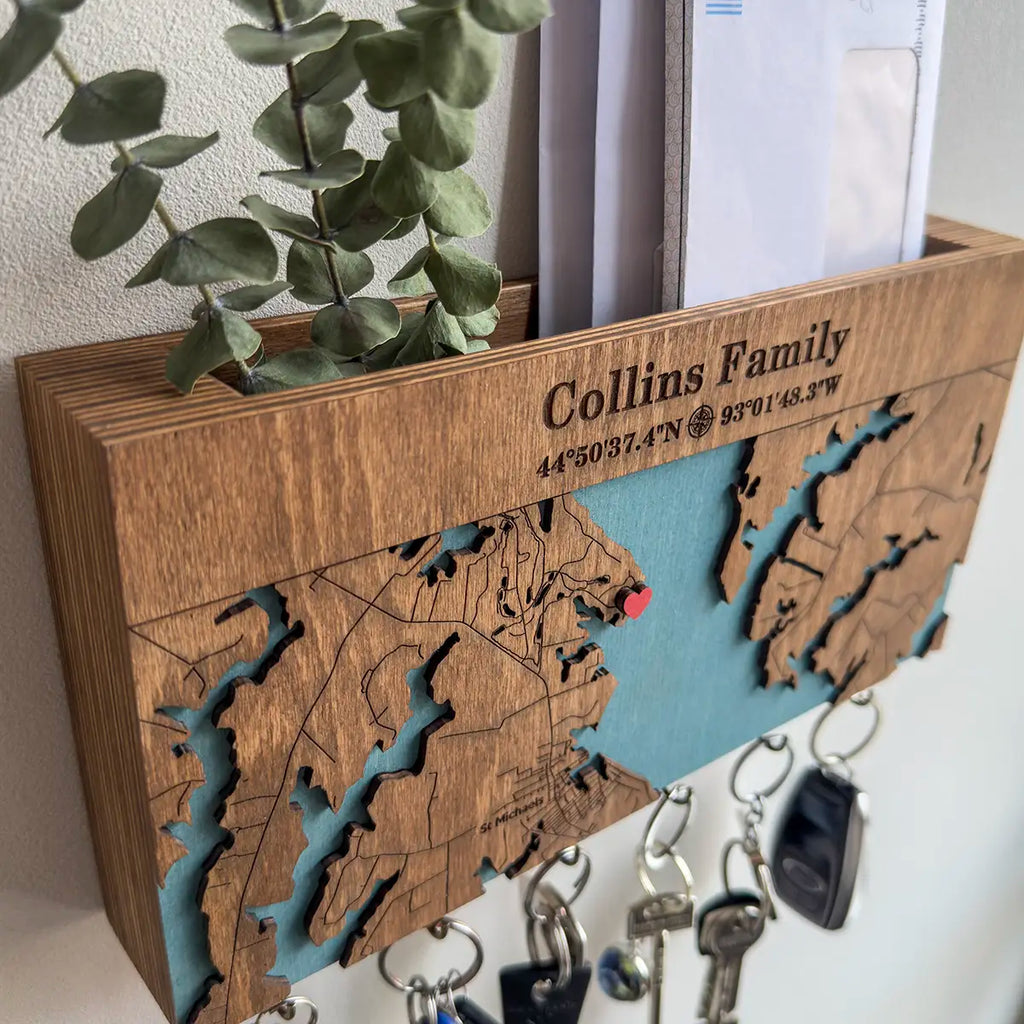 Custom engraved wooden city map key holder with layered plywood design and personalized family coordinates wall key rack