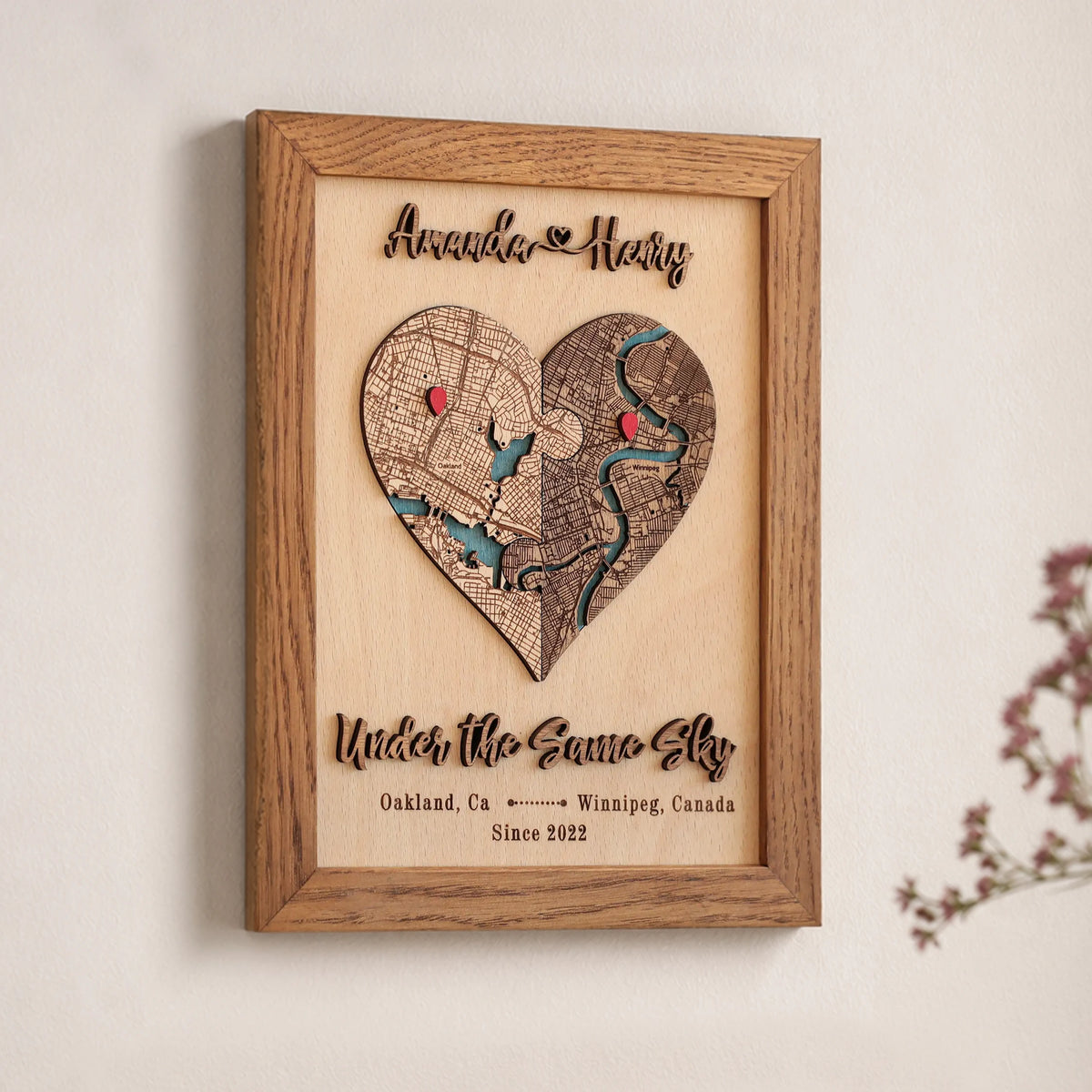Custom heart map in Early American wood frame with two personalized locations, red pins, and raised wooden lettering.
