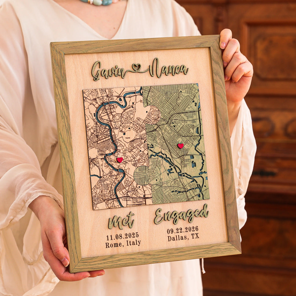 Custom square map held by customer with two meaningful places, red heart pins, raised 3D text, and sage frame.
