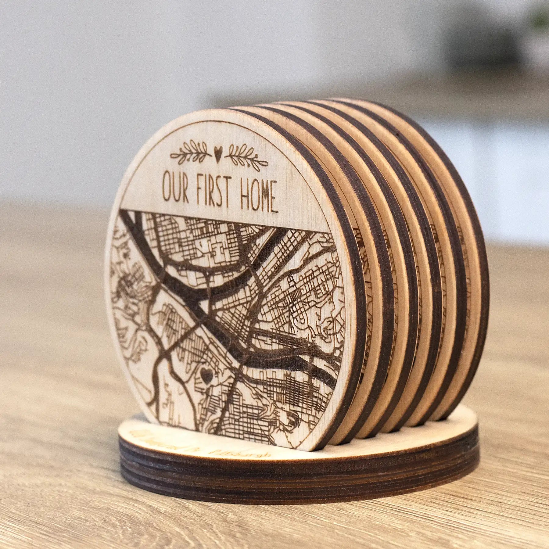 Custom wooden coasters with city map design in a matching holder, personalized first home gift for housewarming