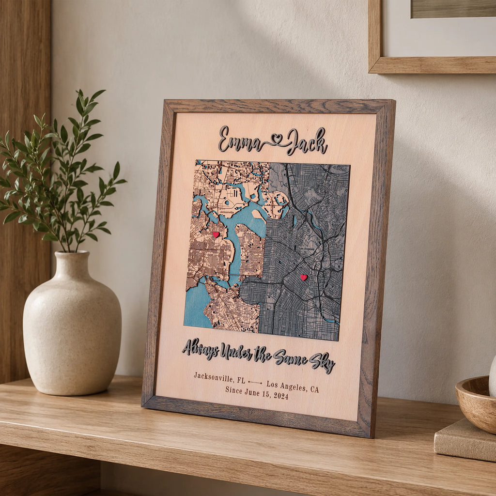 Custom wooden location map displayed on a shelf with grey oak frame, red pins, and personalized anniversary text.