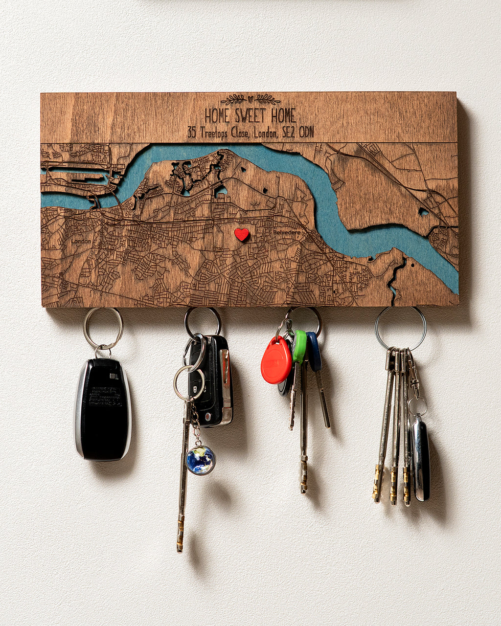 Key holder with custom map design with magnets  on a white wall