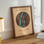 Personalized Our First Home Map in oak frame displayed on a table as custom address wall art for new homeowners
