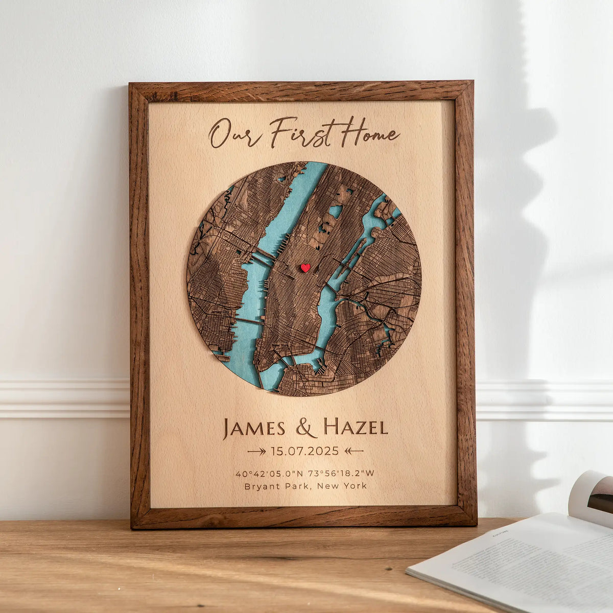 Our First Home Map custom address wall art in solid oak frame with personalized names, date, and location details