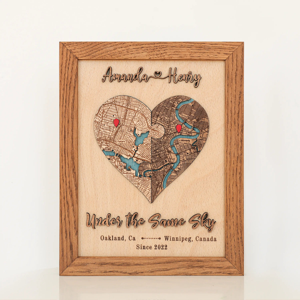 Personalized heart map in Early American frame with custom locations, couple names, date, and romantic phrase.