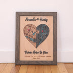 Personalized heart map for couples with two custom locations, red pins, raised lettering, and grey oak frame.