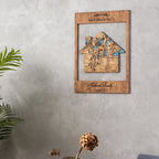 Framed address map housewarming gift displayed on wall in living room, personalized wooden new home keepsake with house-shaped map