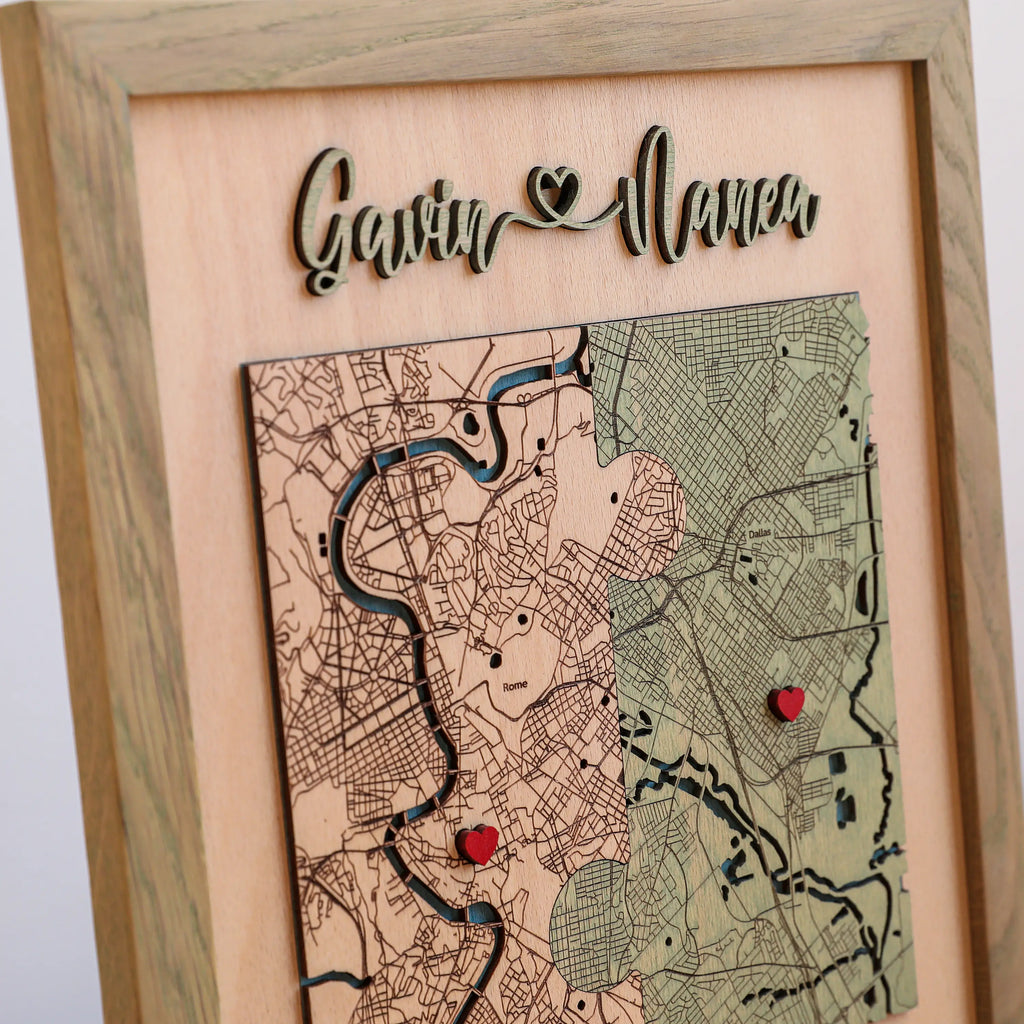 Detailed view of personalized square location map with raised 3D names, red pins, and two custom places.