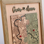 Detailed view of personalized square location map with raised 3D names, red pins, and two custom places.