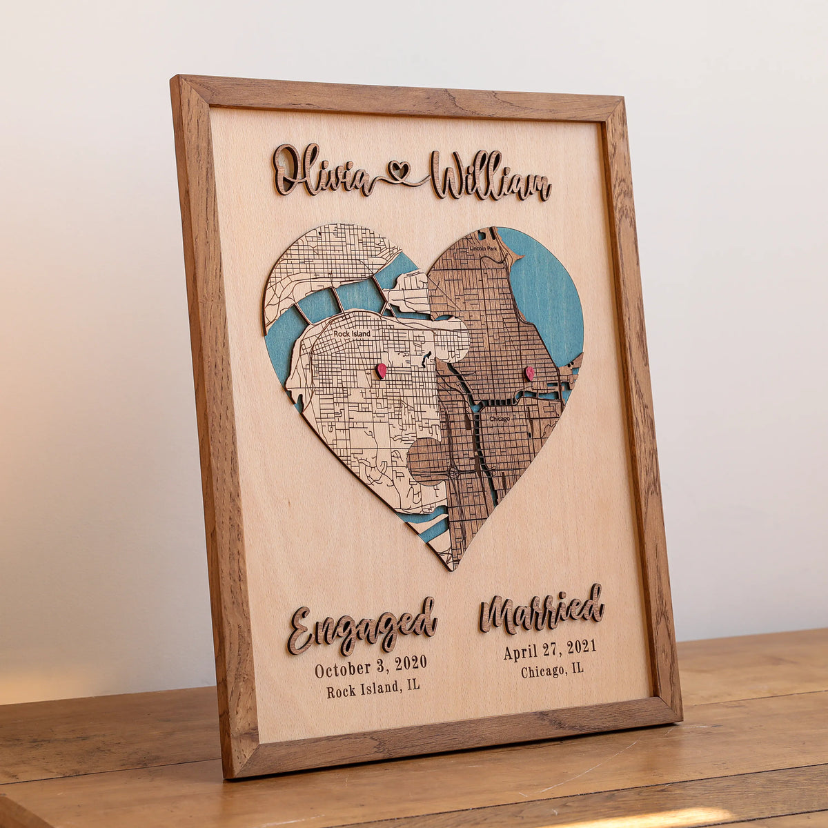 Personalized wedding map gift in Early American wood frame with heart-shaped custom locations, engaged and married dates.