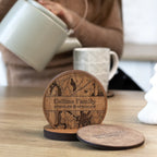 Personalized wooden coaster set for housewarming displayed on table in cozy kitchen lifestyle setting