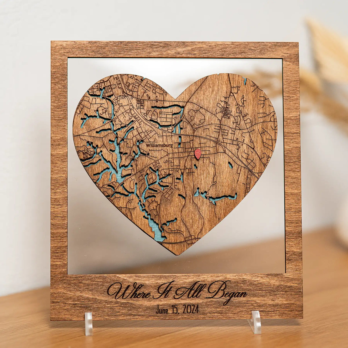 Personalized Where It All Began wooden heart map in frame displayed on a table