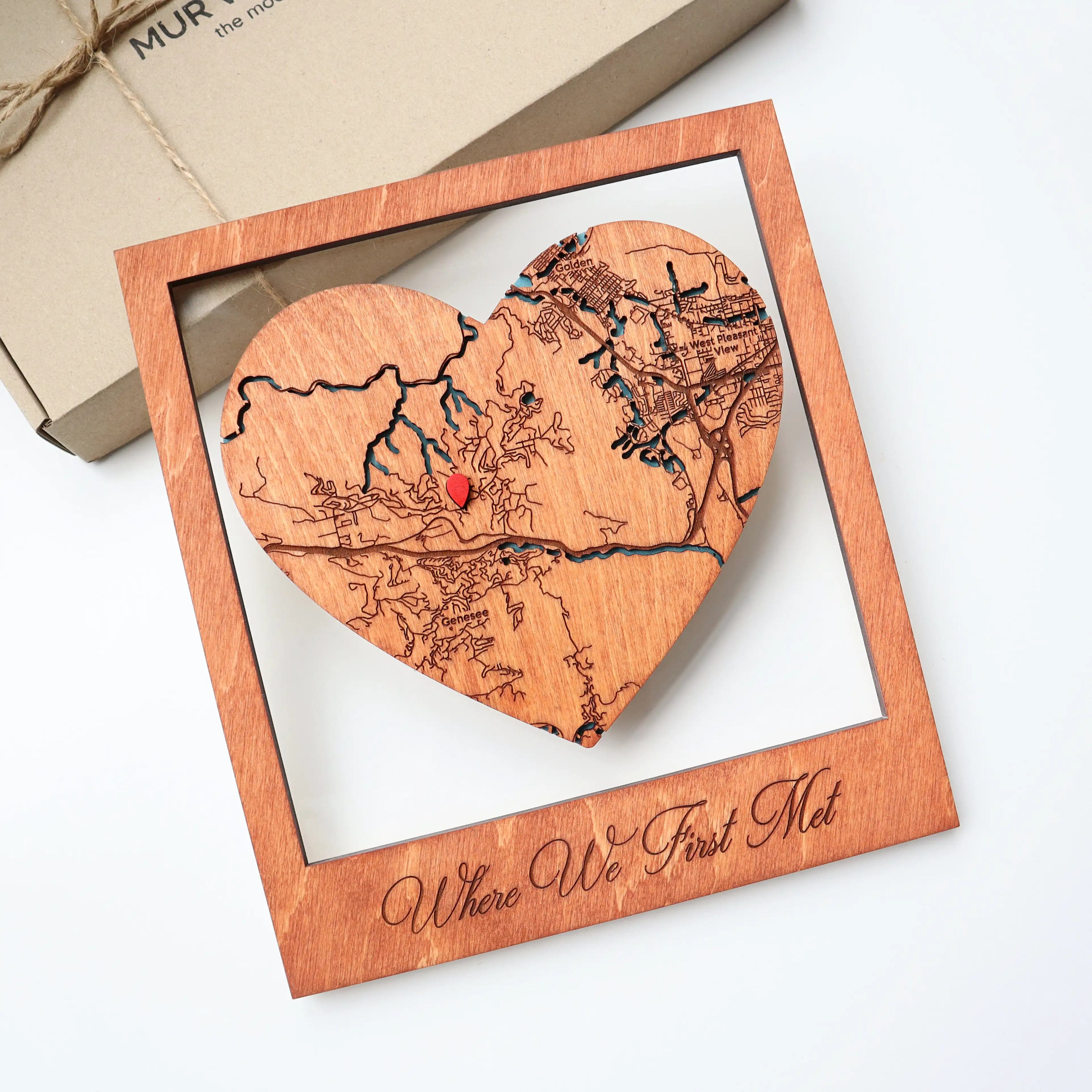 Personalized Where We First Met wooden heart map in frame shown with gift-ready packaging