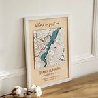 Where We First Met wooden map in white frame displayed on table in angled view