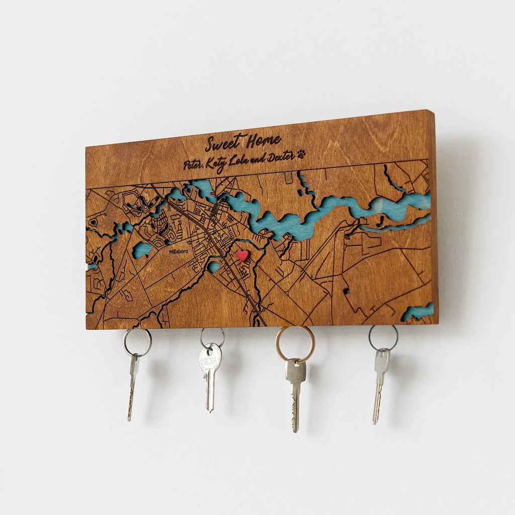 Wooden key holder for wall with personalized map design and hanging keys front view